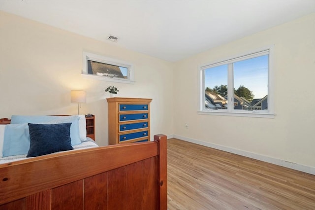 bedroom featuring light hardwood / wood-style floors