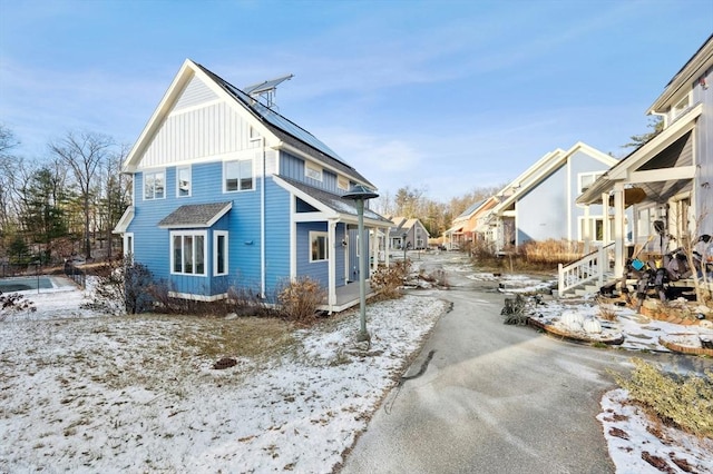 view of snow covered property