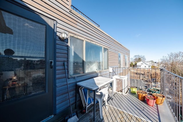 balcony featuring central AC