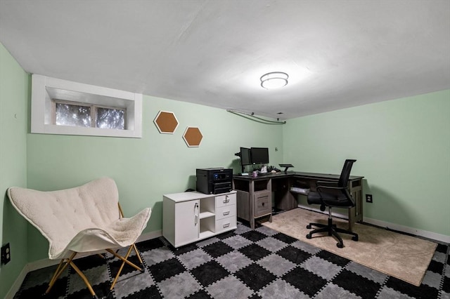 office space with baseboards