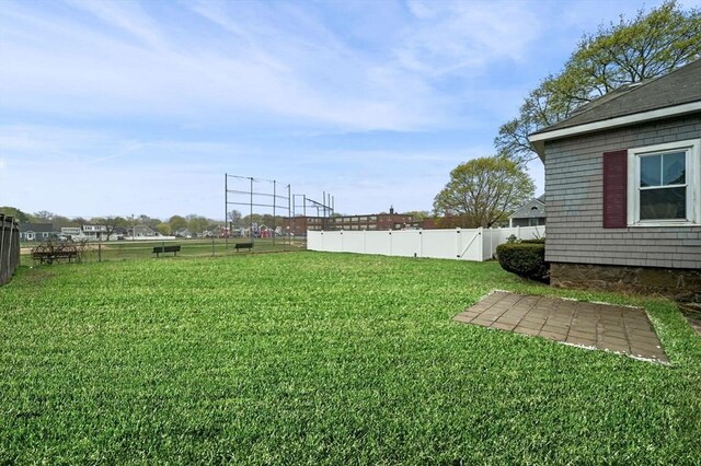 view of yard featuring fence