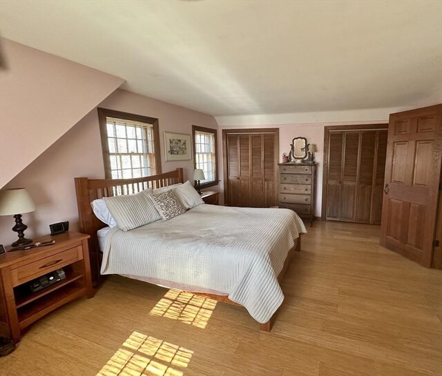 32 Machipscat Trl, West Tisbury, MA 02575 - bedroom featuring light wood finished floors and multiple closets