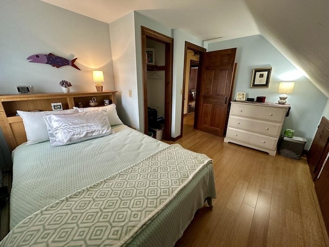 32 Machipscat Trl, West Tisbury, MA 02575 - bedroom with lofted ceiling, a closet, and wood finished floors