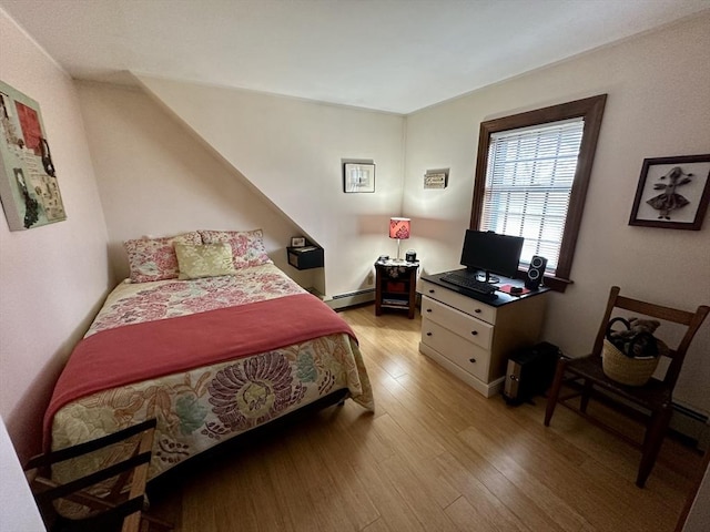 32 Machipscat Trl, West Tisbury, MA 02575 - bedroom featuring light wood-style floors and a baseboard heating unit