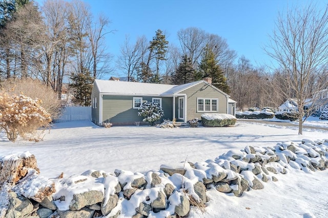 view of snow covered property