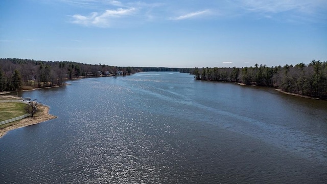 73 Spur Rd, Dover, NH 03820 - water view featuring a heavily wooded area