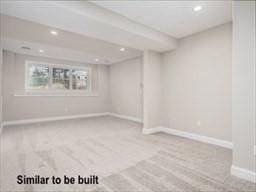 below grade area featuring baseboards and recessed lighting