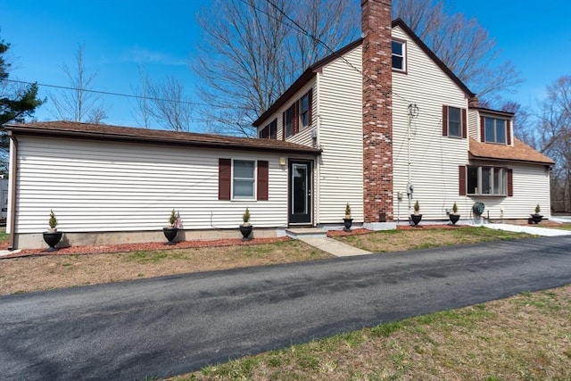 view of front of property with a chimney