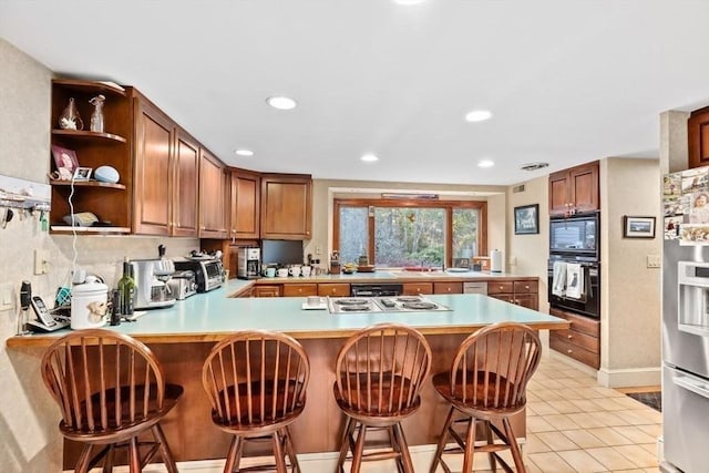 26 Mordecai Lincoln Rd, Scituate, MA 02066 - kitchen featuring black appliances, a peninsula, open shelves, recessed lighting, and light countertops
