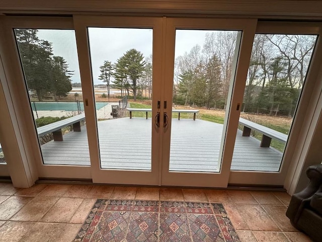 26 Mordecai Lincoln Rd, Scituate, MA 02066 - doorway to outside featuring stone tile flooring, healthy amount of natural light, and french doors