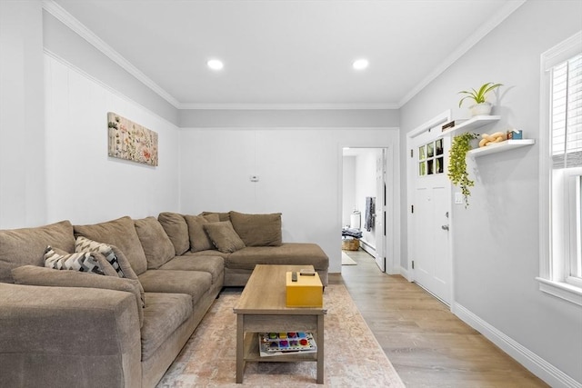 78 Conserve Ave, Westport, MA 02790 - living room featuring light wood finished floors, recessed lighting, ornamental molding, and baseboards