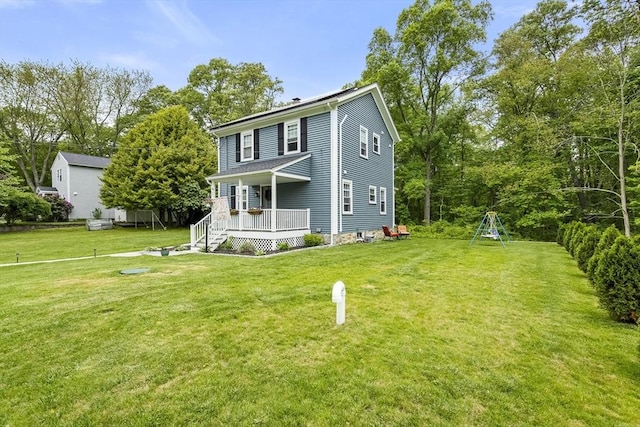 78 Conserve Ave, Westport, MA 02790 - view of front of property featuring a front yard and covered porch