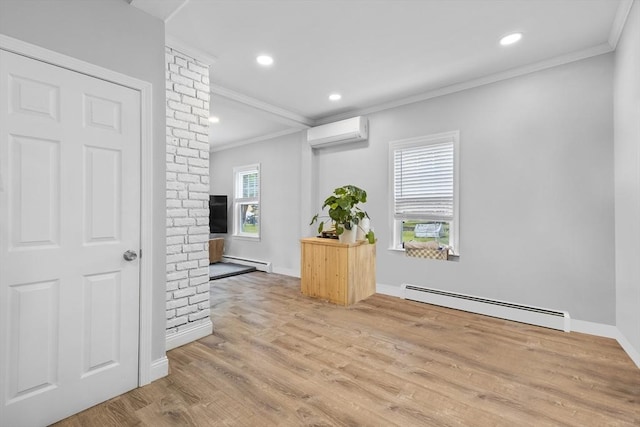 78 Conserve Ave, Westport, MA 02790 - unfurnished room with a baseboard radiator, crown molding, a wall mounted AC, baseboards, and light wood-style floors