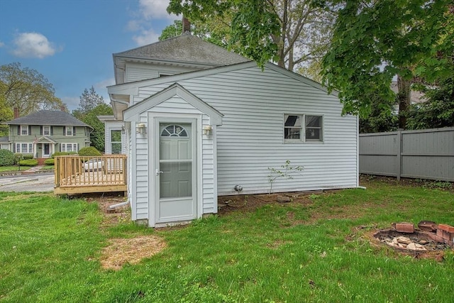 rear view of property with a deck