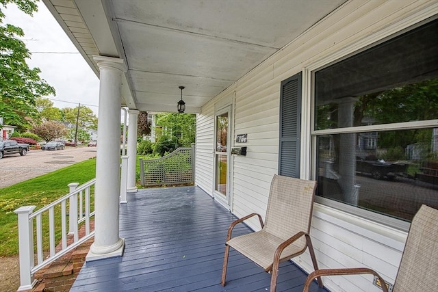 wooden terrace with covered porch