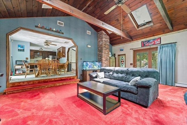 9 Oak Hill Rd, Mendon, MA 01756 - living area featuring ceiling fan, decorative columns, carpet flooring, wood ceiling with exposed beams, and a skylight