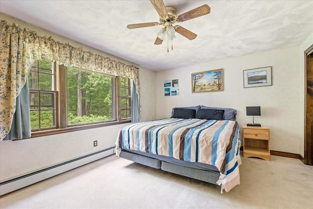9 Oak Hill Rd, Mendon, MA 01756 - bedroom featuring baseboard heating, light colored carpet, baseboards, and ceiling fan
