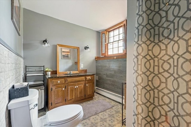 9 Oak Hill Rd, Mendon, MA 01756 - bathroom with toilet, a baseboard heating unit, vanity, and tile patterned floors