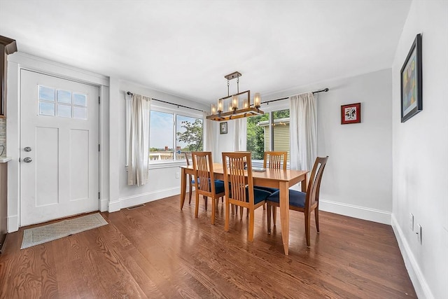 39 Madison St Unit 2, Somerville, MA 02143 - dining room with a chandelier and dark wood finished floors