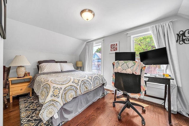 39 Madison St Unit 2, Somerville, MA 02143 - bedroom featuring vaulted ceiling, wood finished floors, and an office area