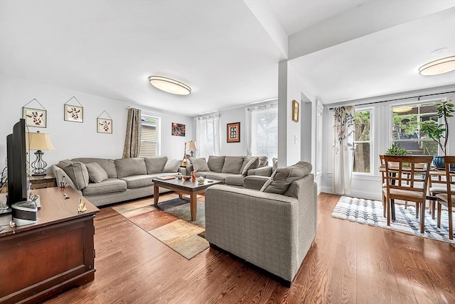 39 Madison St Unit 2, Somerville, MA 02143 - living room with plenty of natural light and wood finished floors