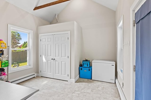 12 Russell St, Amesbury, MA 01913 - unfurnished bedroom with refrigerator, a baseboard radiator, lofted ceiling, and a closet