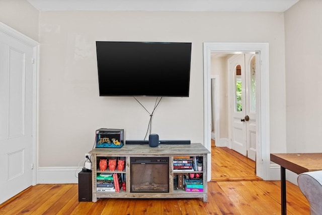 12 Russell St, Amesbury, MA 01913 - living room with hardwood / wood-style floors and baseboards