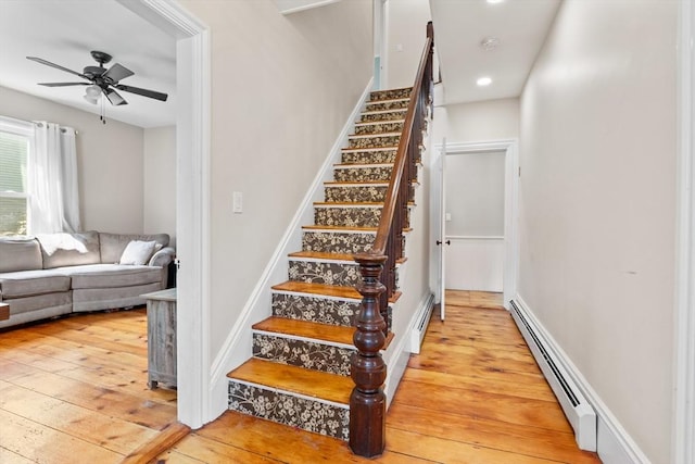 12 Russell St, Amesbury, MA 01913 - stairway featuring baseboard heating, hardwood / wood-style floors, a ceiling fan, and recessed lighting