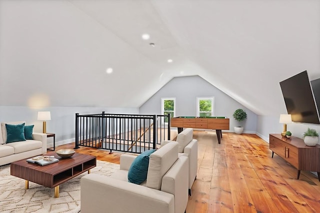 12 Russell St, Amesbury, MA 01913 - living area featuring vaulted ceiling, light wood finished floors, and recessed lighting