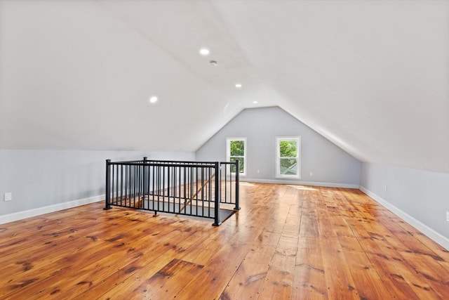 12 Russell St, Amesbury, MA 01913 - bonus room featuring hardwood / wood-style floors, vaulted ceiling, and recessed lighting
