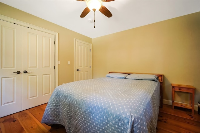 bedroom featuring hardwood / wood-style floors and ceiling fan