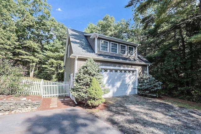 view of home's exterior featuring a garage