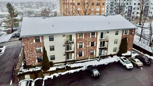 view of snow covered property