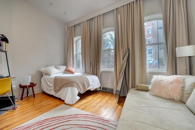 bedroom featuring wood finished floors