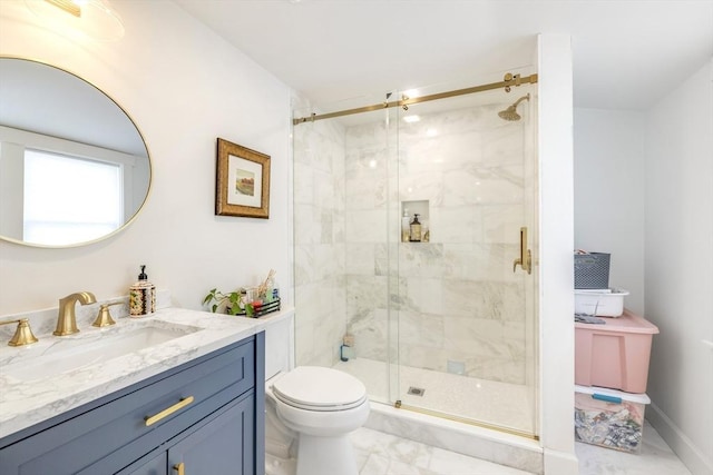 full bath with baseboards, toilet, marble finish floor, vanity, and a shower stall