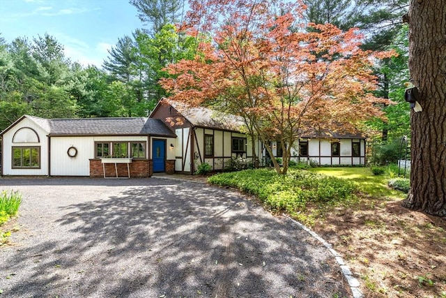 321 Sudbury St, Marlborough, MA 01752 - view of front of property with driveway and roof with shingles