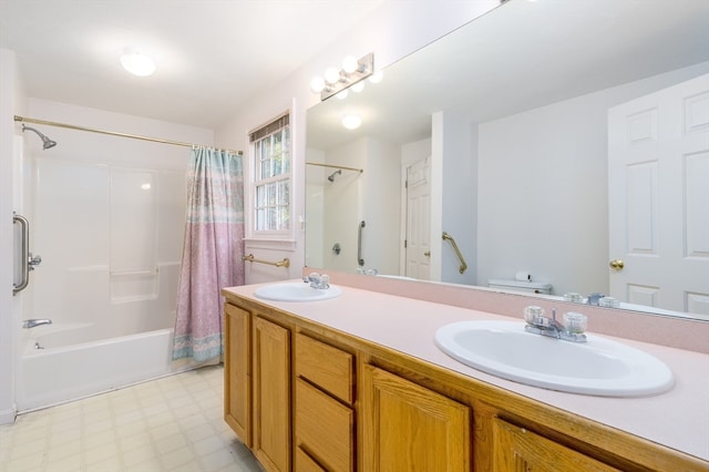 full bathroom featuring vanity, toilet, and shower / bath combination with curtain