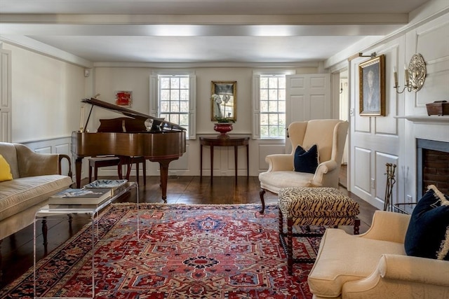 sitting room featuring dark hardwood / wood-style flooring