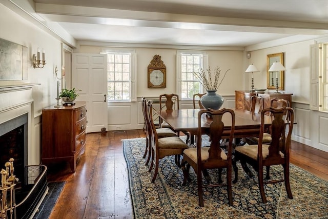 dining space featuring dark hardwood / wood-style flooring