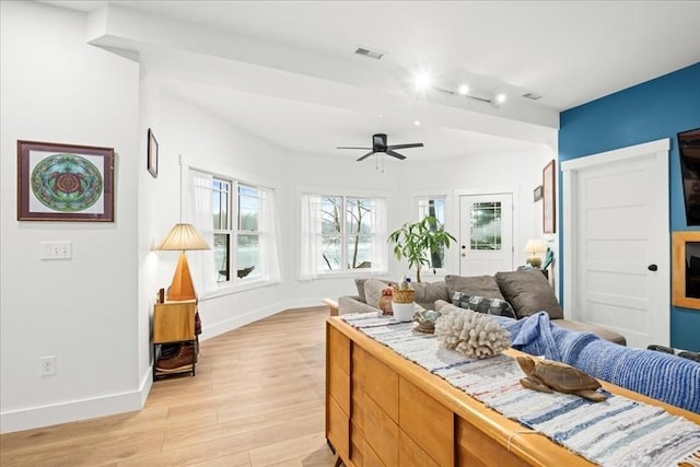 interior space with light hardwood / wood-style floors and ceiling fan