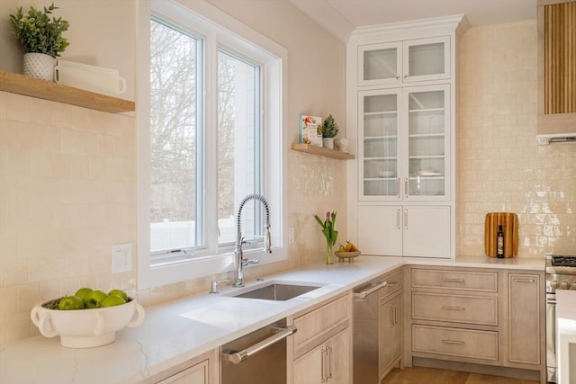 234 Valley Rd, Needham, MA 02492 - kitchen with tasteful backsplash, glass insert cabinets, stainless steel appliances, open shelves, and a sink