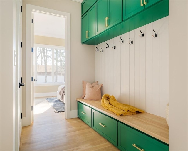 234 Valley Rd, Needham, MA 02492 - mudroom featuring baseboards and light wood-type flooring