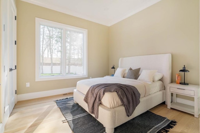 234 Valley Rd, Needham, MA 02492 - bedroom with visible vents, light wood finished floors, and baseboards