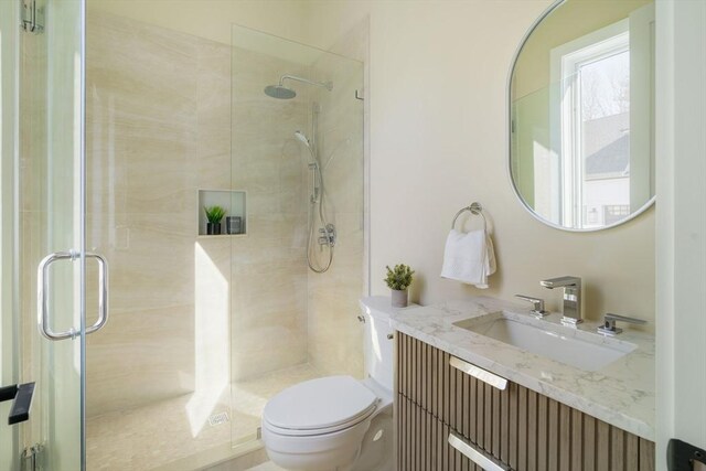 234 Valley Rd, Needham, MA 02492 - full bathroom with vanity, toilet, and a stall shower