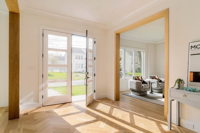 234 Valley Rd, Needham, MA 02492 - entryway with ornamental molding and baseboards