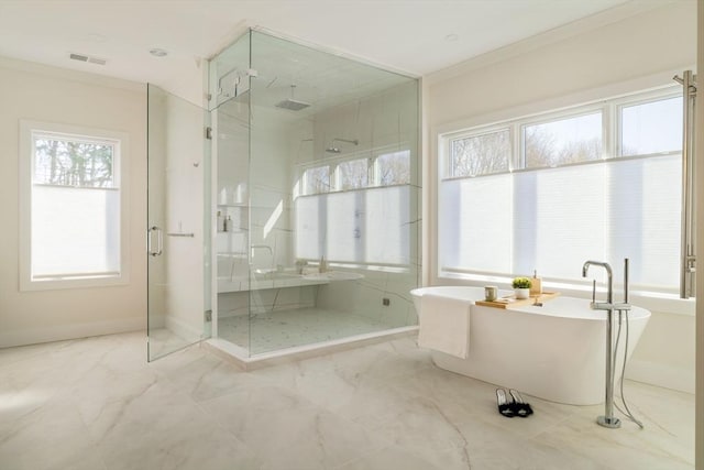 234 Valley Rd, Needham, MA 02492 - bathroom featuring visible vents, a stall shower, baseboards, a freestanding tub, and marble finish floor