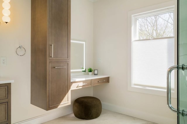 234 Valley Rd, Needham, MA 02492 - full bathroom with tile patterned flooring, an enclosed shower, vanity, and baseboards