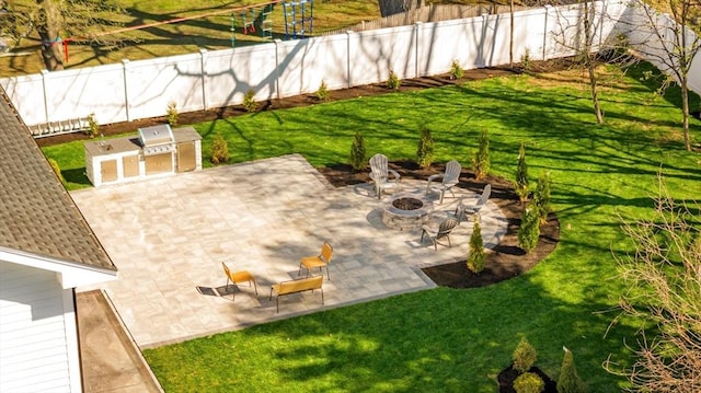 234 Valley Rd, Needham, MA 02492 - view of patio / terrace with area for grilling, fence, and an outdoor fire pit