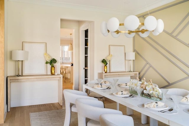 234 Valley Rd, Needham, MA 02492 - dining room featuring crown molding and wood finished floors