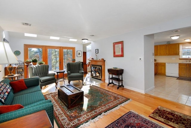 living room with light hardwood / wood-style floors